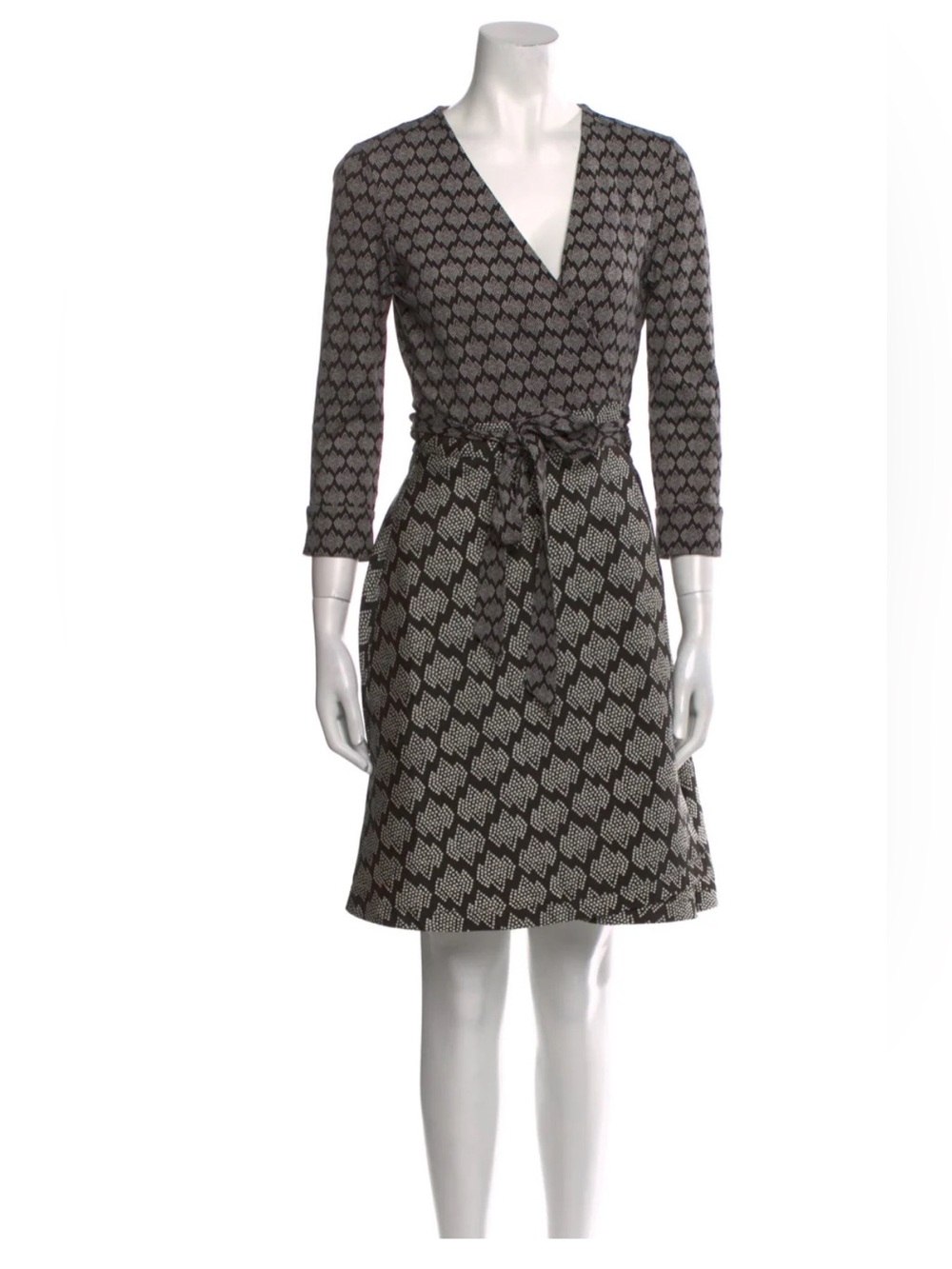 Diane von Furstenberg black and white wrap dress with 3/4 sleeves. Size: 2